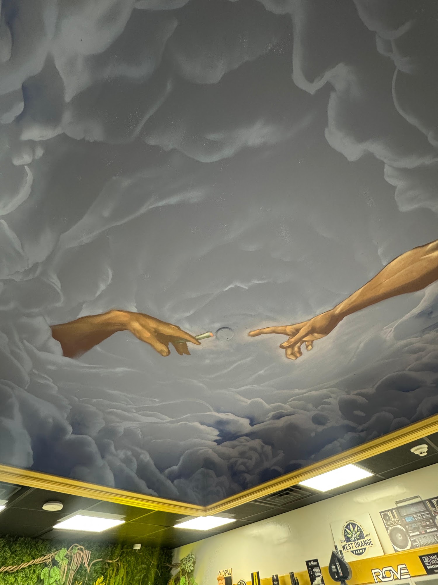 The hand-painted ceiling mural at Hamm & Chaz in Jersey City — cannabis delivery to Union County, NJ